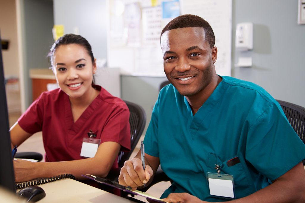 two young professionals in medical setting